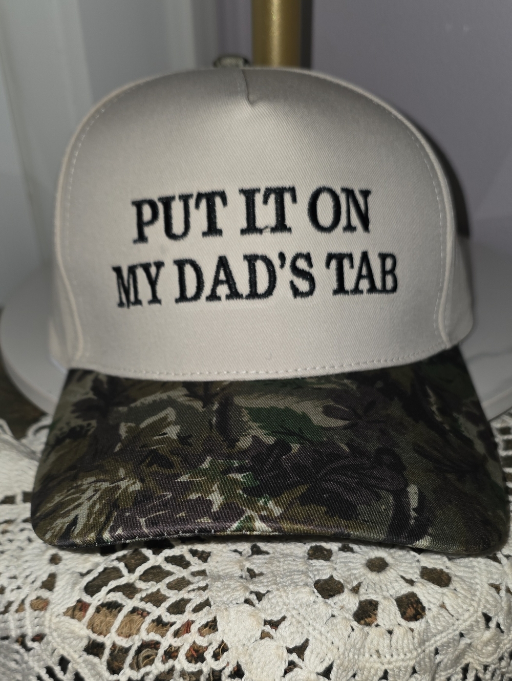 Put It On My Dad's Tab Beige & Camouflage Trucker Hat